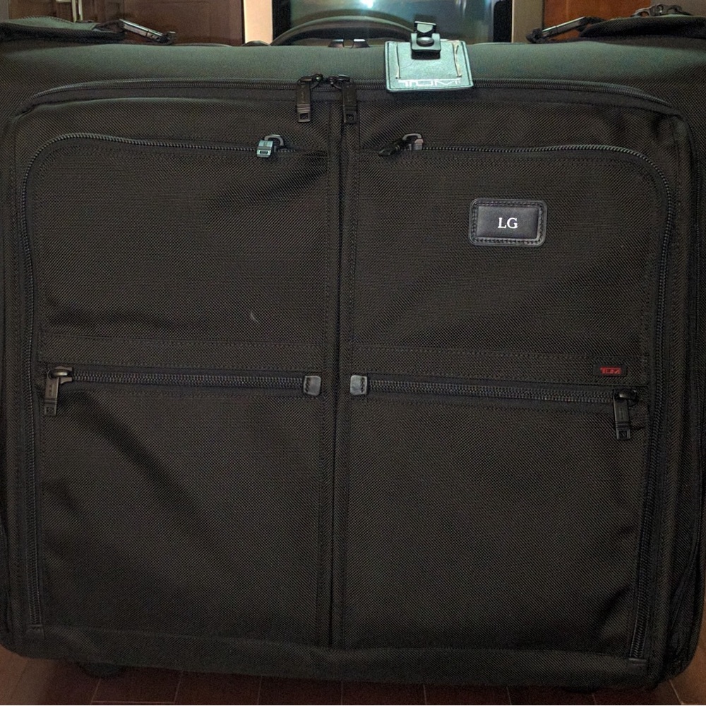 Tumi Black Professional Travel Luggage
